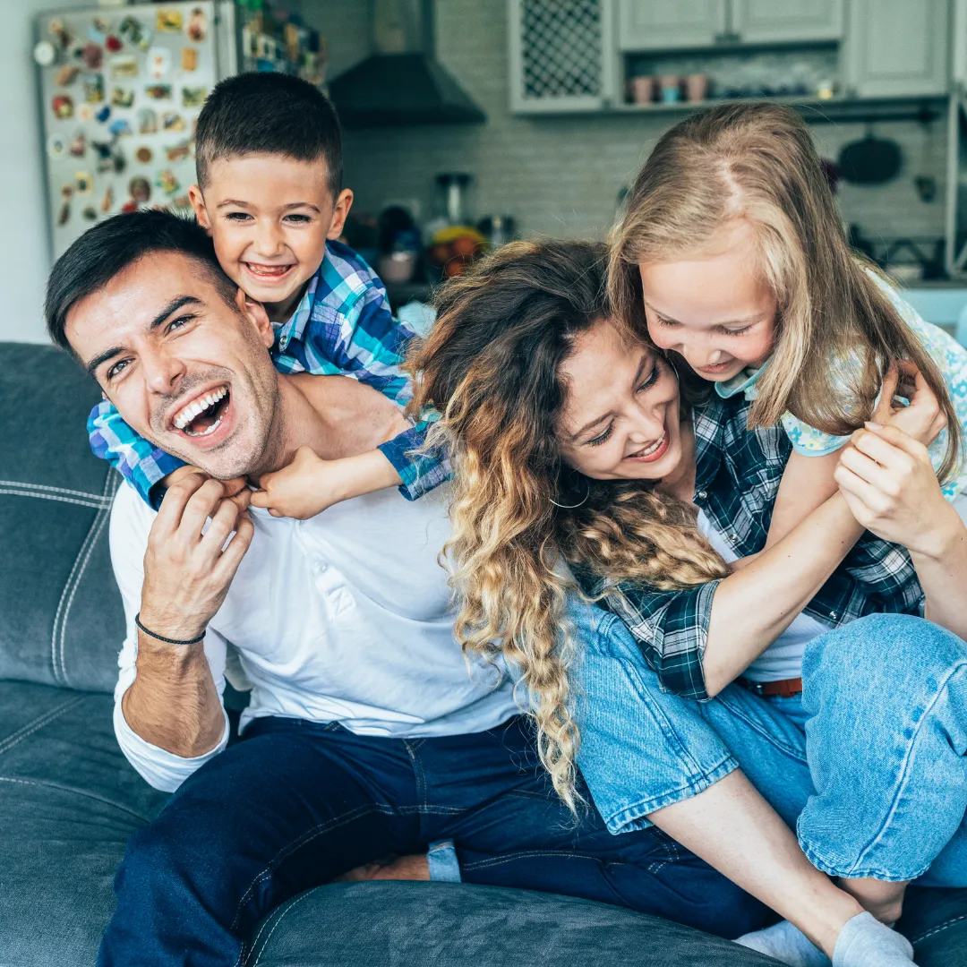 Joyful family enjoying their secure financial future
