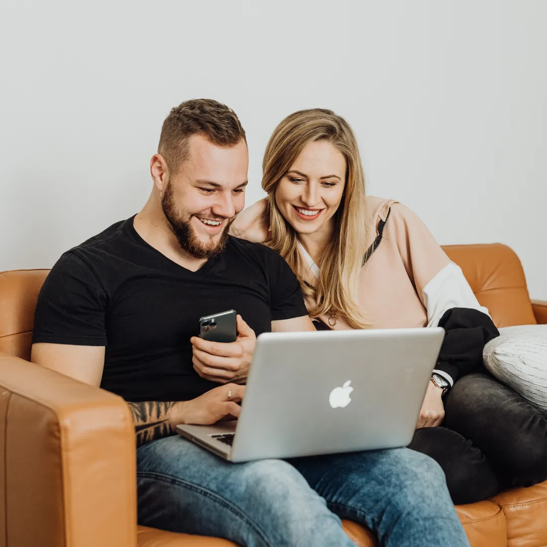 A couple planning their finances with Franklin Madison Private Wealth’s online resources.